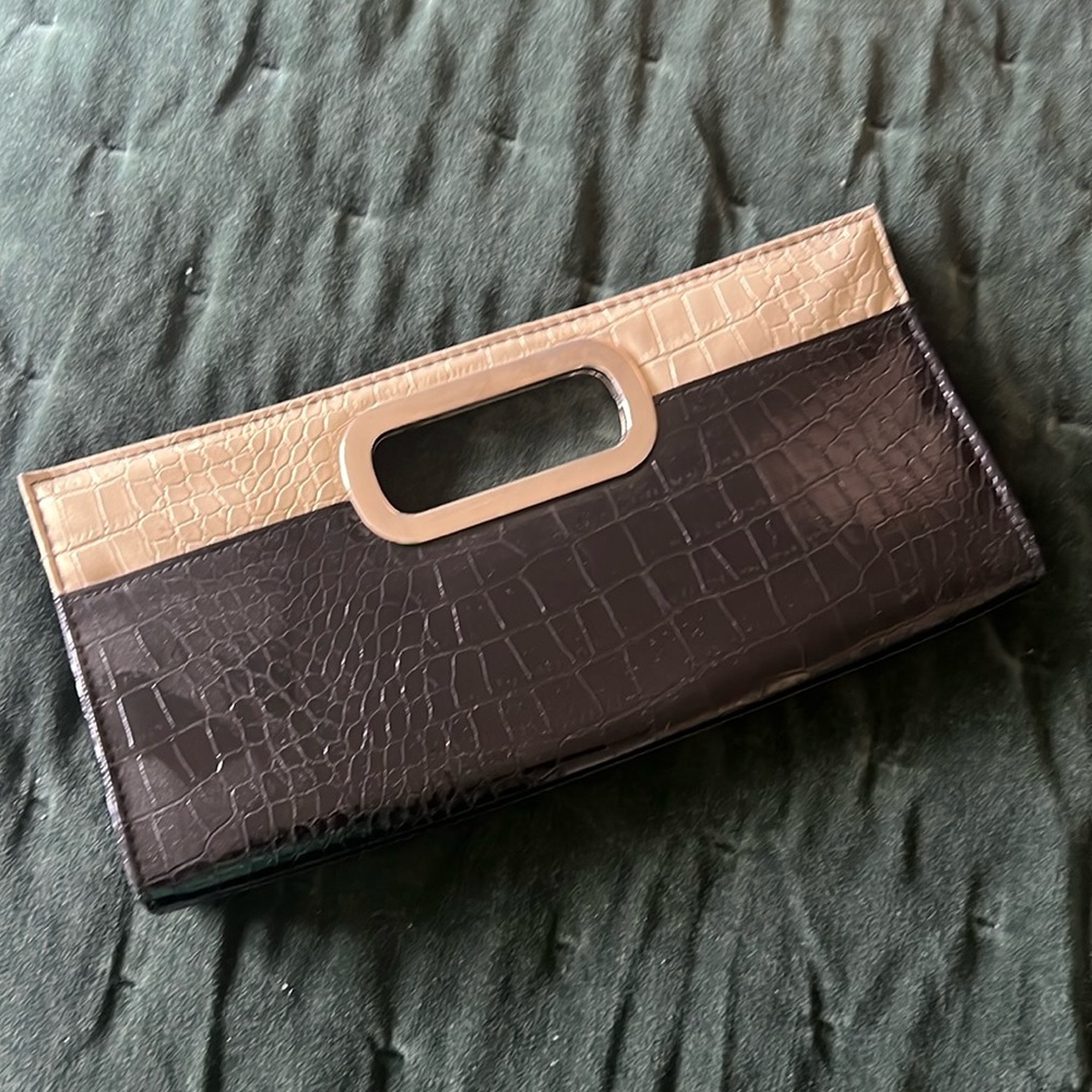 Black and beige snakeskin leather clutch with silver handle